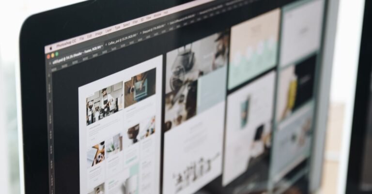 A modern computer screen displaying web design work, showcasing creative visuals in a workspace.